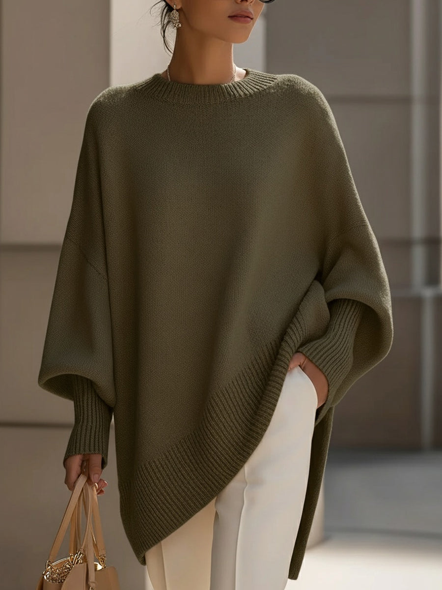 Damen Oversize-Pullover in grun mit asymmetrischem Saum, Frontansicht am Modell