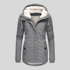 Lange wasserdichte Damen Winterjacke in Grau mit Kapuze und warmem Futter – Haus92